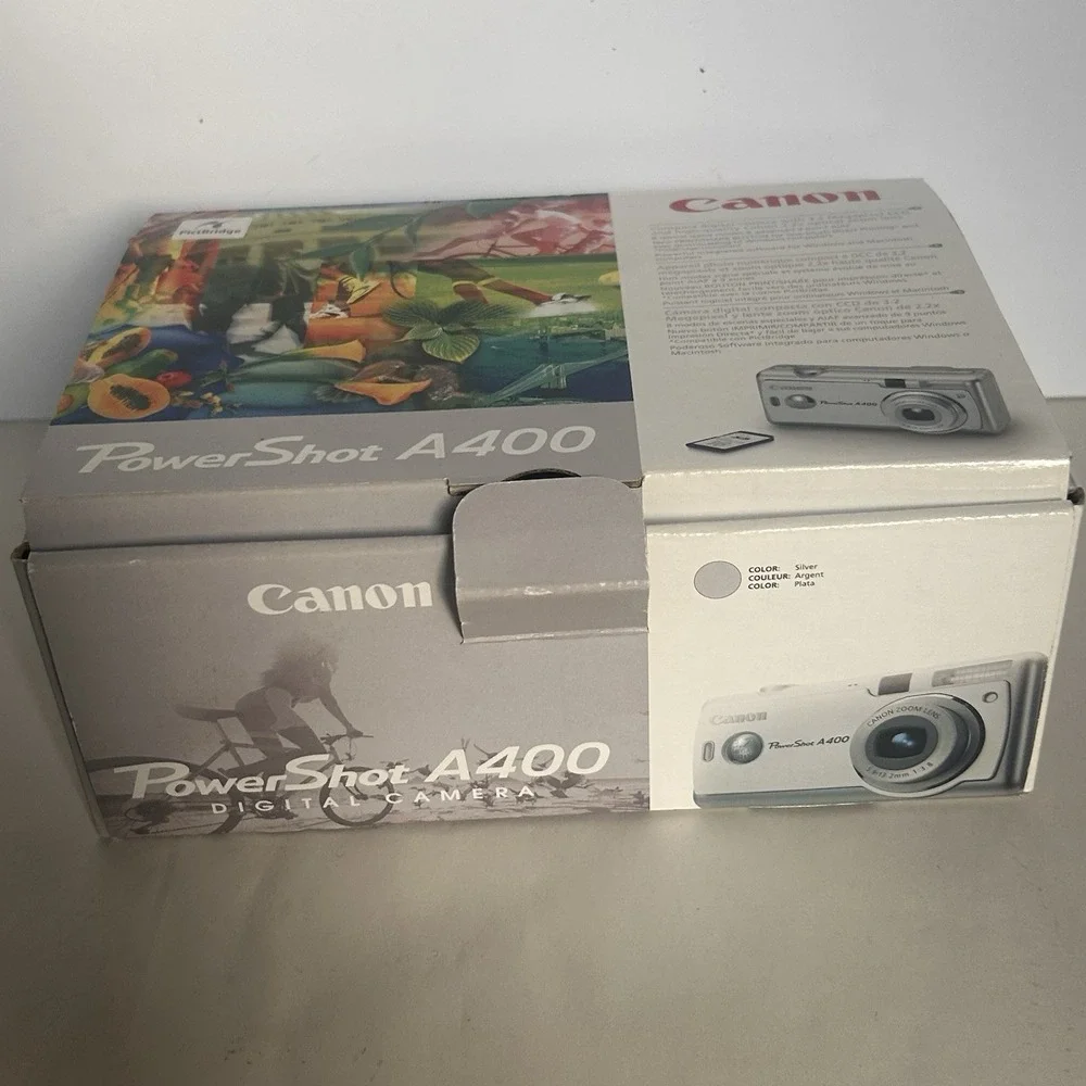 Canon PowerShot PC 1080 Digital Camera  Silver Tested  No USB w/Box ,Manual & SD